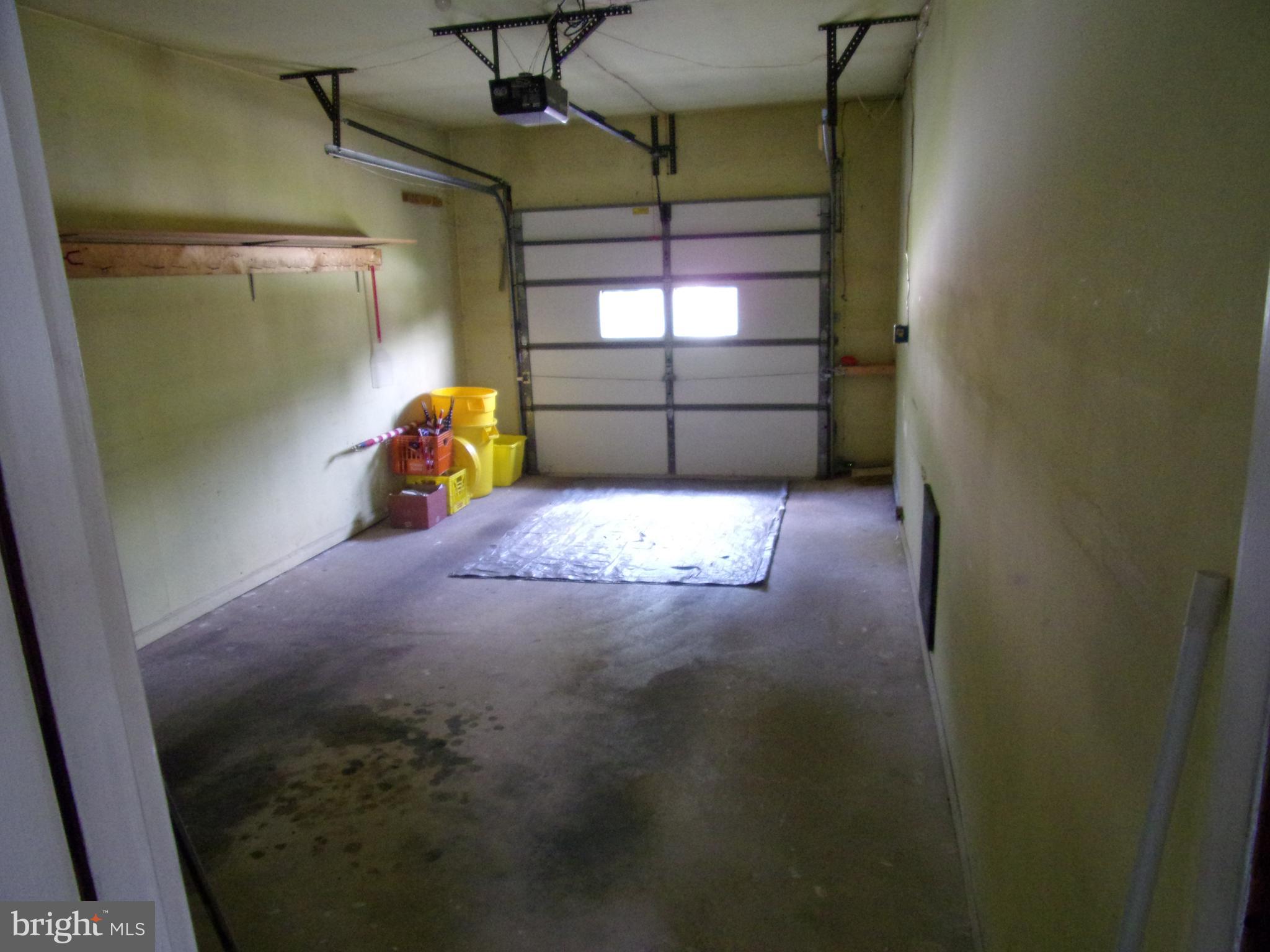 806 West Rolling Road Springfield, PA 19064 - Photo 8 of 39 Inside view of 1-car garage w/elec door