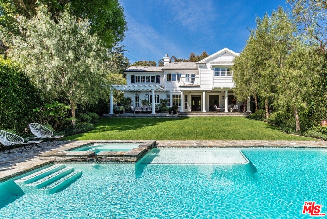 826 Greentree Road Pacific Palisades, CA 90272 - Photo 26 of 29 a view of a house with a yard patio and a patio