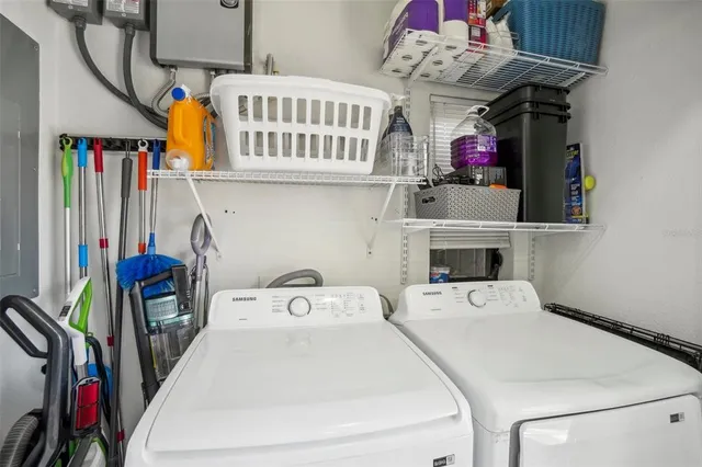 a utility room with dryer and washer