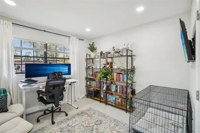 a view of a workspace with furniture