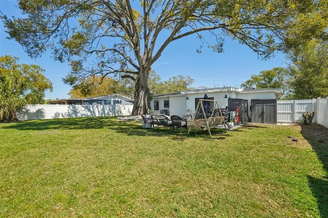 front view of a house with a big yard