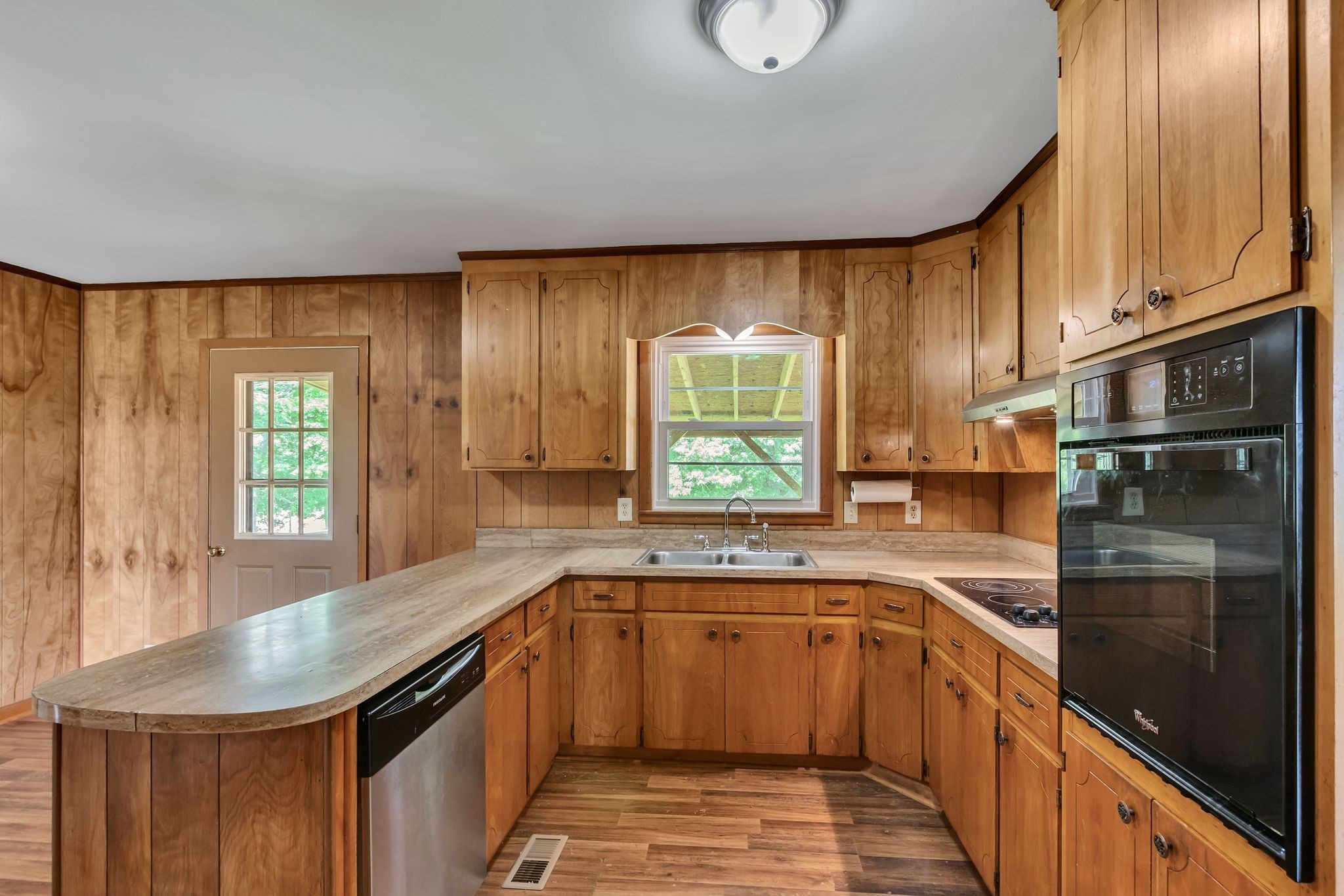 3211 Gum Creek Road Decherd, TN 37324 - Photo 21 of 35 a kitchen with a sink stove and cabinets