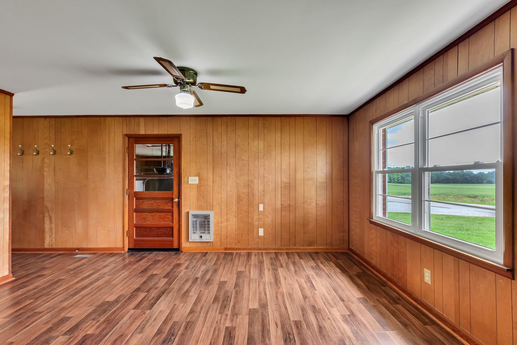 3211 Gum Creek Road Decherd, TN 37324 - Photo 24 of 35 wooden floor in an empty room with a window