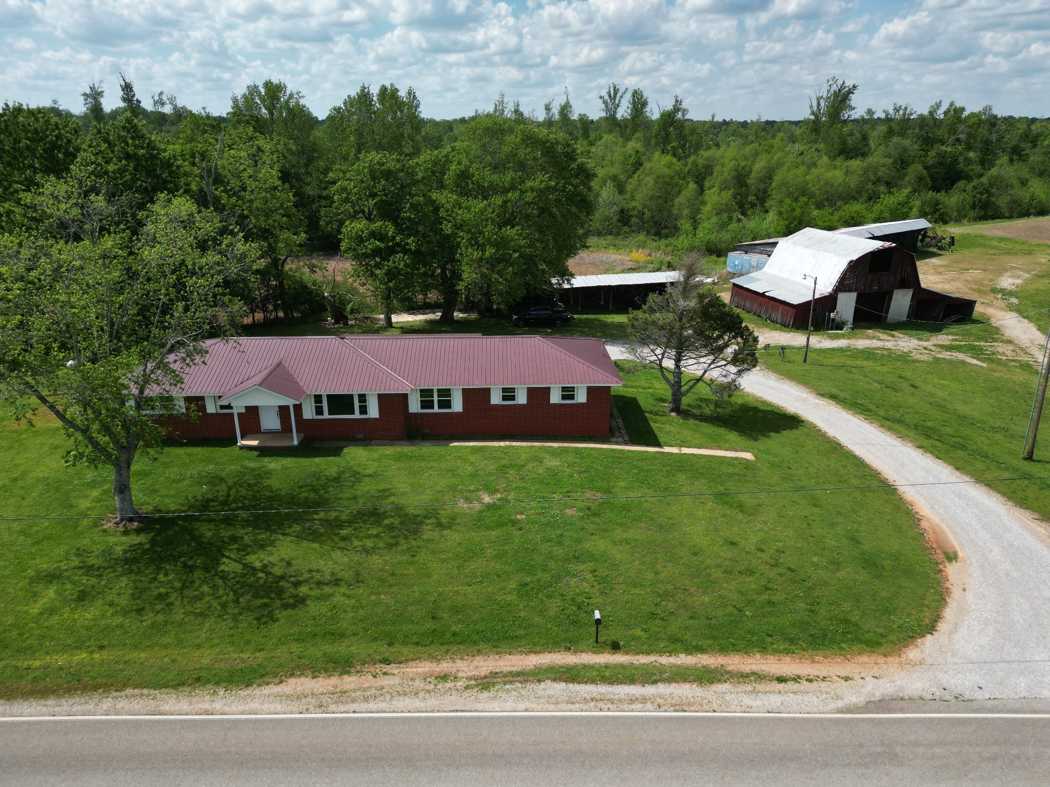 3211 Gum Creek Road Decherd, TN 37324 - Photo 29 of 35 a view of a house with a yard
