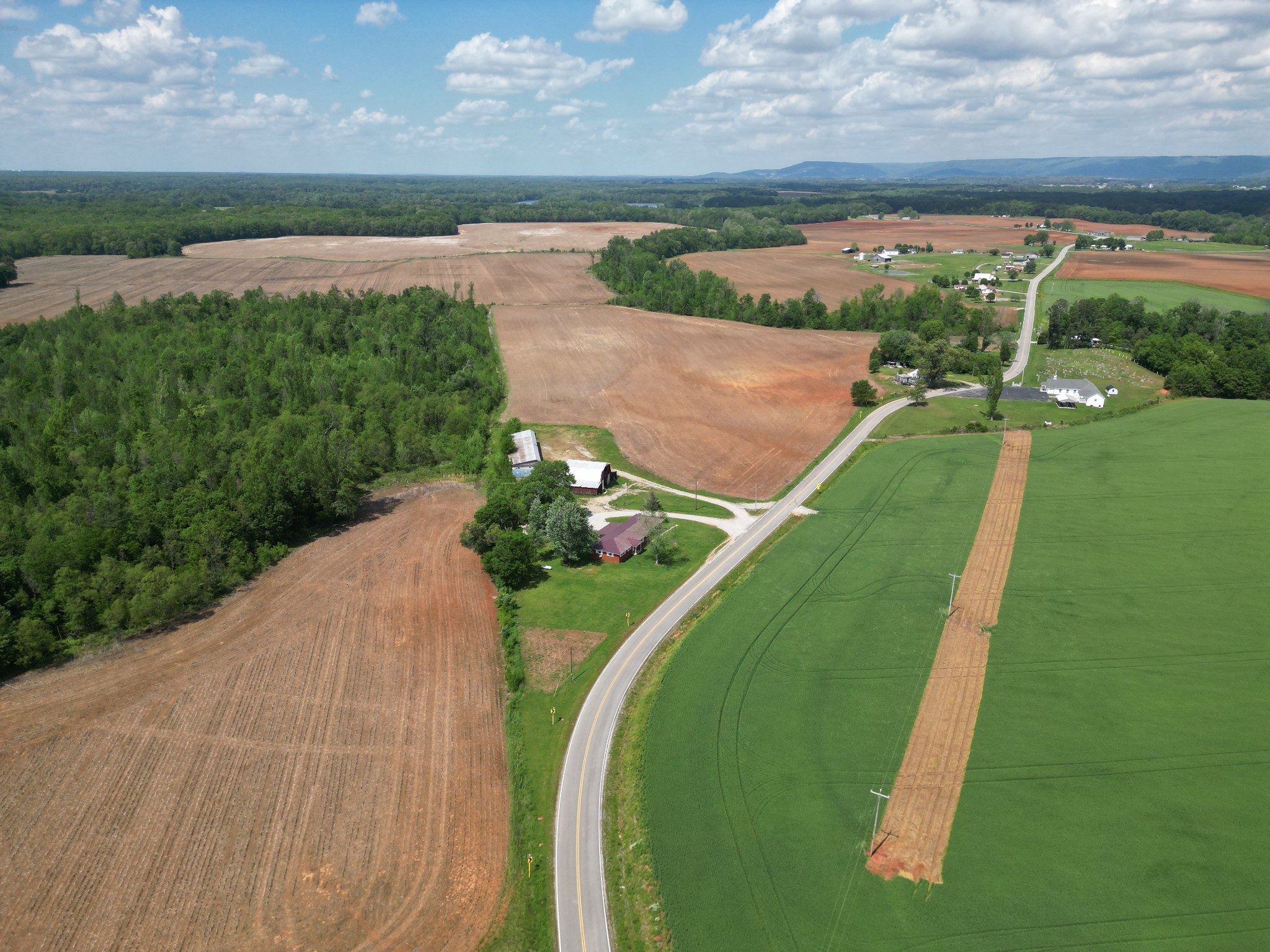 3211 Gum Creek Road Decherd, TN 37324 - Photo 31 of 35 a view of a lake with a yard