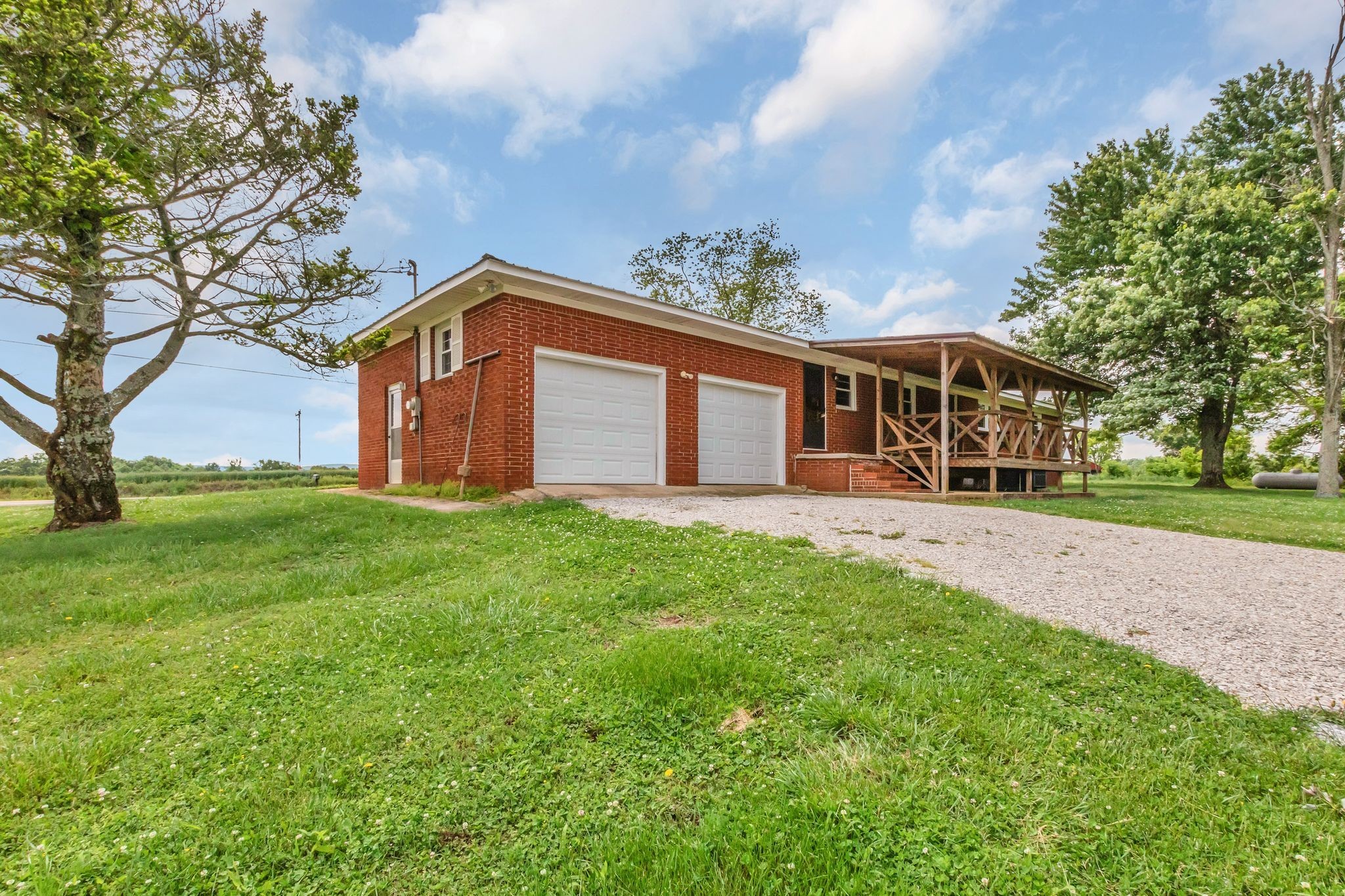 3211 Gum Creek Road Decherd, TN 37324 - Photo 6 of 35 a front view of house with yard and green space