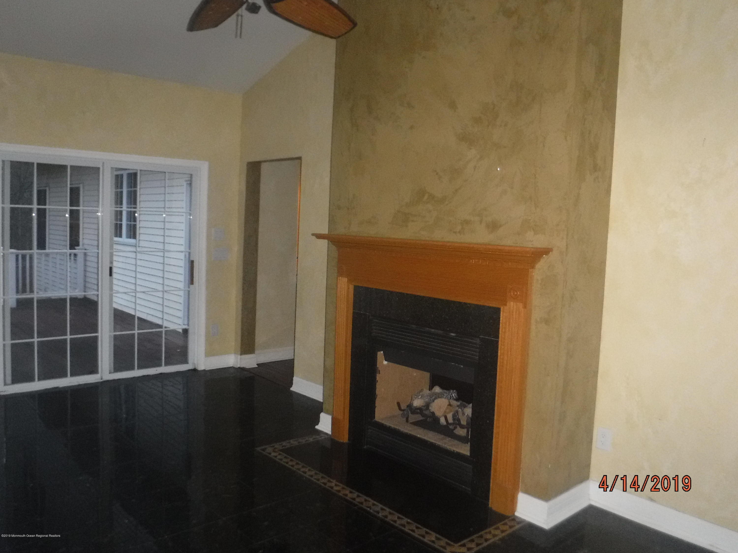 270 Butterfly Road Jackson, NJ 08527 - Photo 33 of 39 Morning room with fireplace