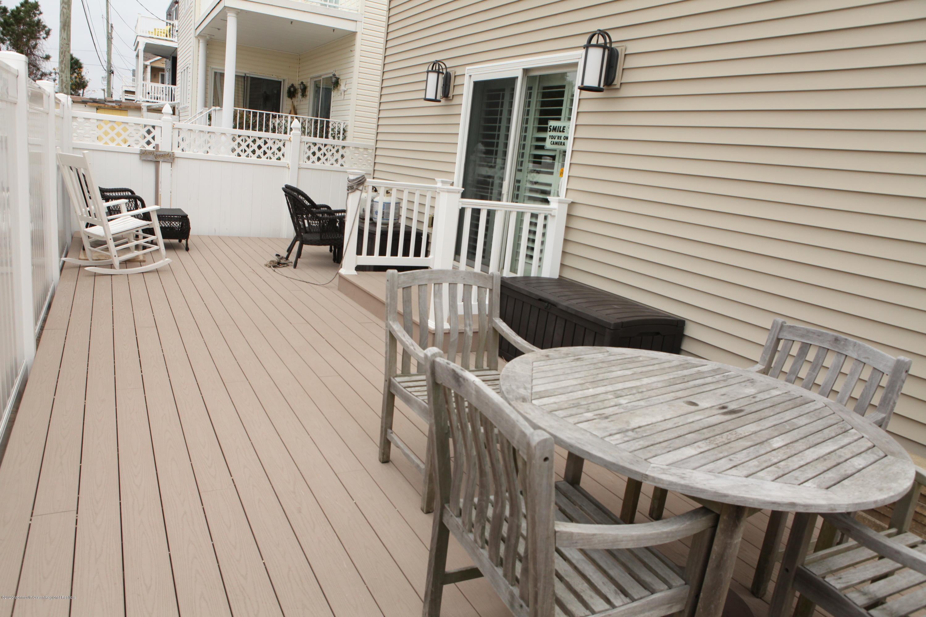 17 Colony Road Seaside Heights, NJ 08751 - Photo 12 of 37 a roof deck with a table and chairs