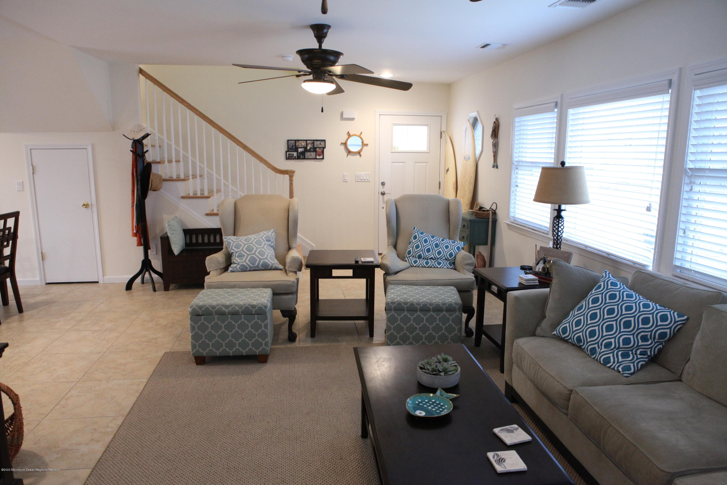 17 Colony Road Seaside Heights, NJ 08751 - Photo 17 of 37 a living room with furniture and a chandelier