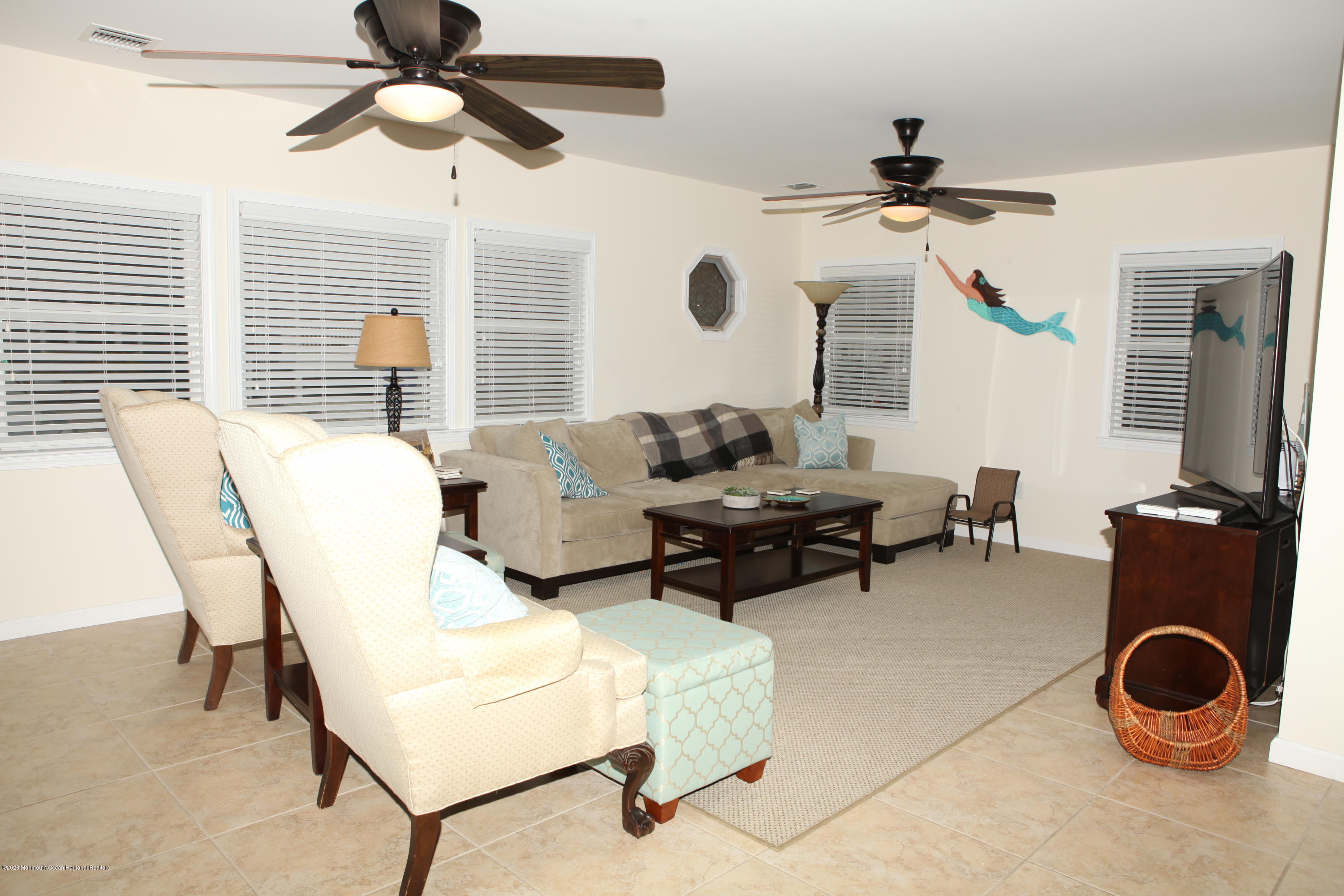 17 Colony Road Seaside Heights, NJ 08751 - Photo 19 of 37 a living room with furniture and a large window