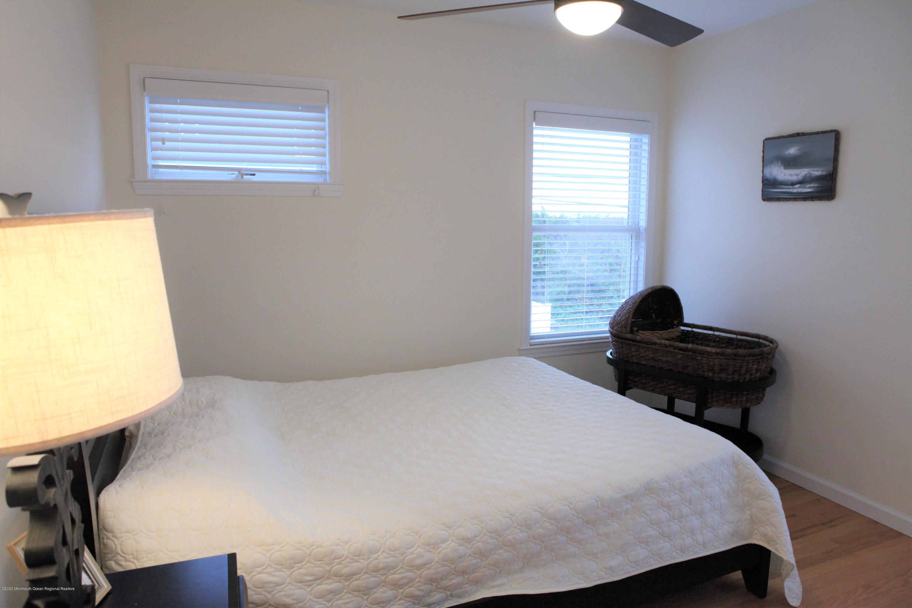 17 Colony Road Seaside Heights, NJ 08751 - Photo 25 of 37 a bedroom with a bed and a window
