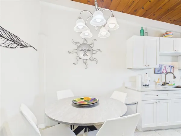 a view of a kitchen area with stainless steel appliances