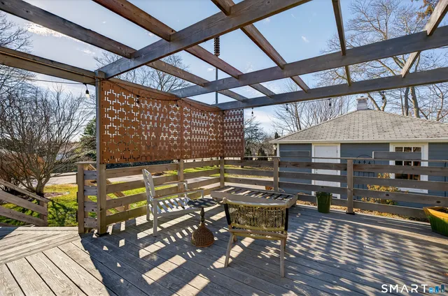 a view of a chairs and table in the patio