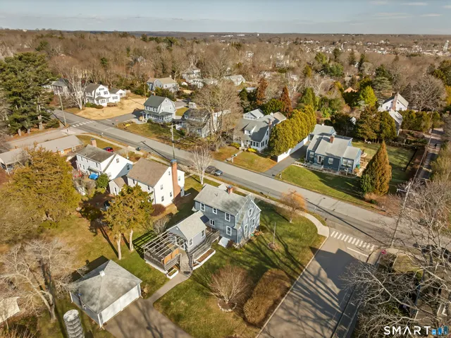a front view of a house with yard
