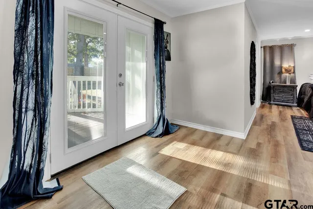 a bedroom with a bed and a table in it