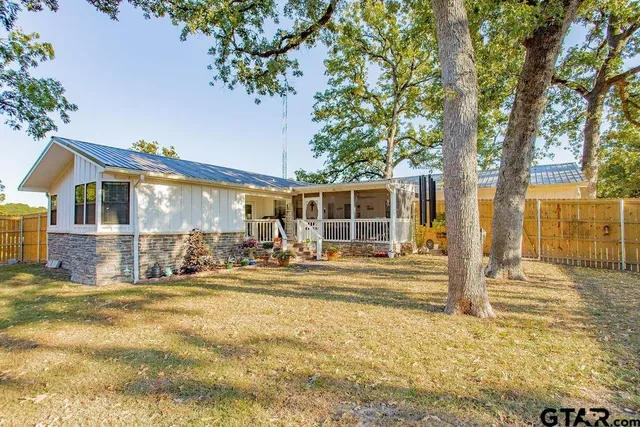 a front view of a house with a outdoor space
