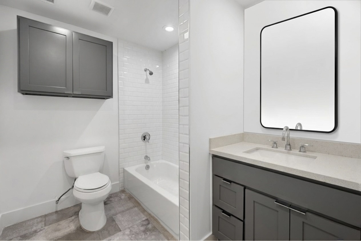 234 Westheimer Road, Unit 4 Houston, TX 77006 - Photo 9 of 16 Bathroom With Framed Mirror
