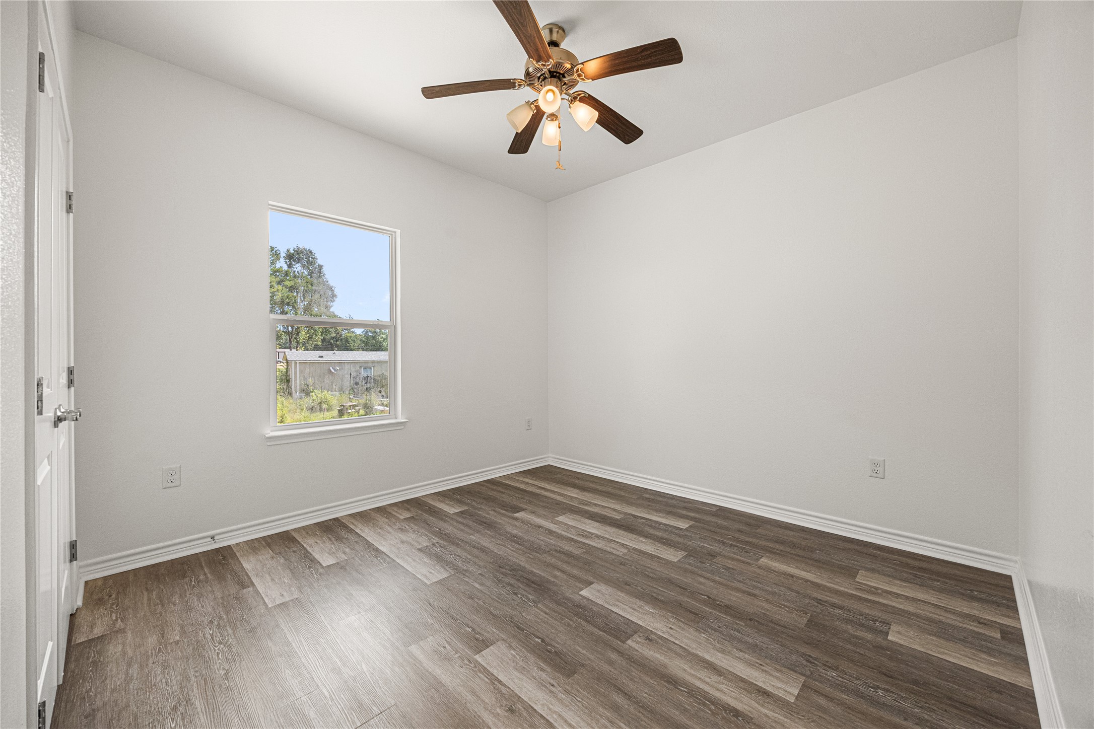 28096 7 Sisters Road, Unit A New Caney, TX 77357 - Photo 16 of 19 Secondary bedroom at the front of the home
