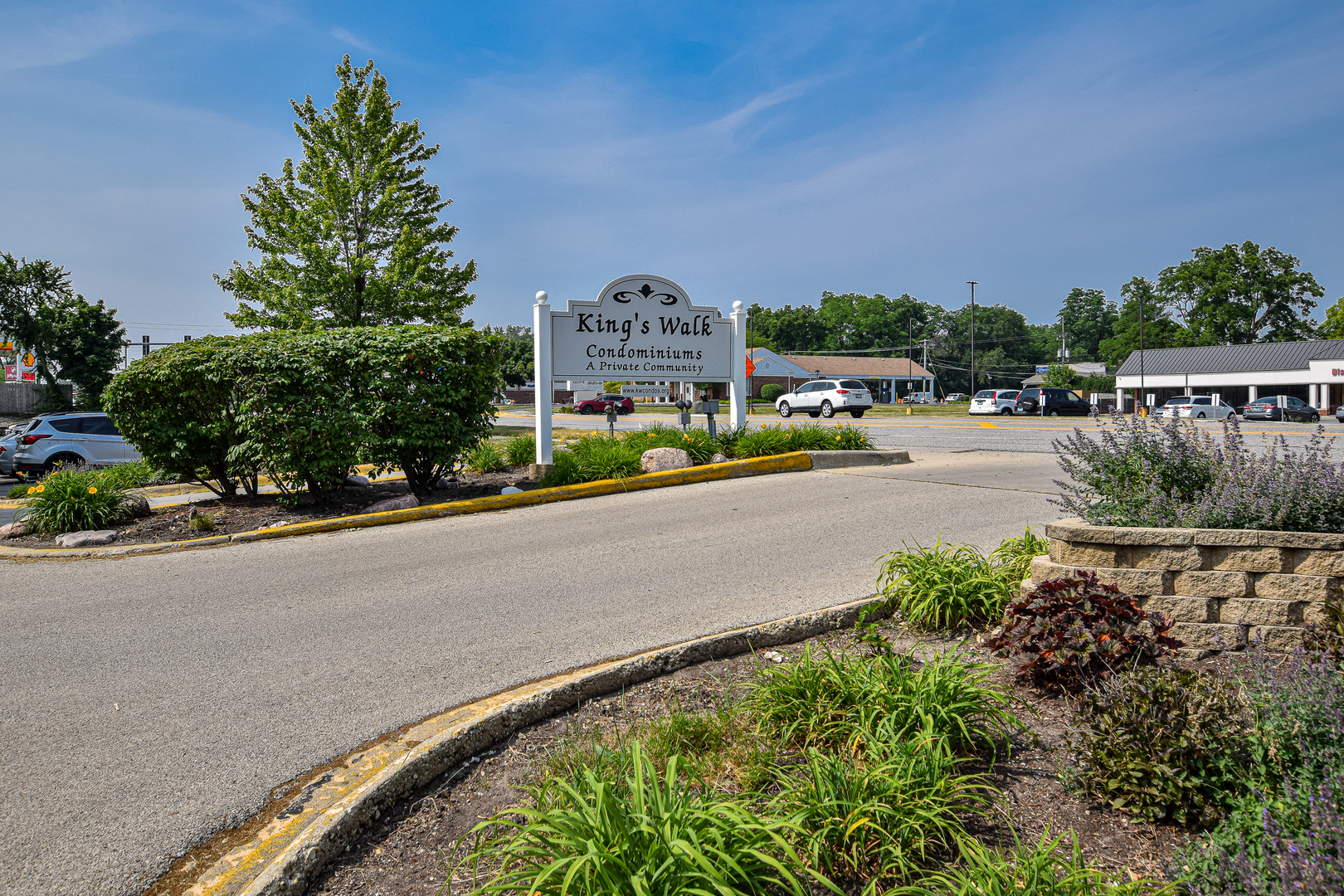 1802 Plum Grove Road, Unit 2A Rolling Meadows, IL 60008 - Photo 3 of 19 a view of a street with a building in the background