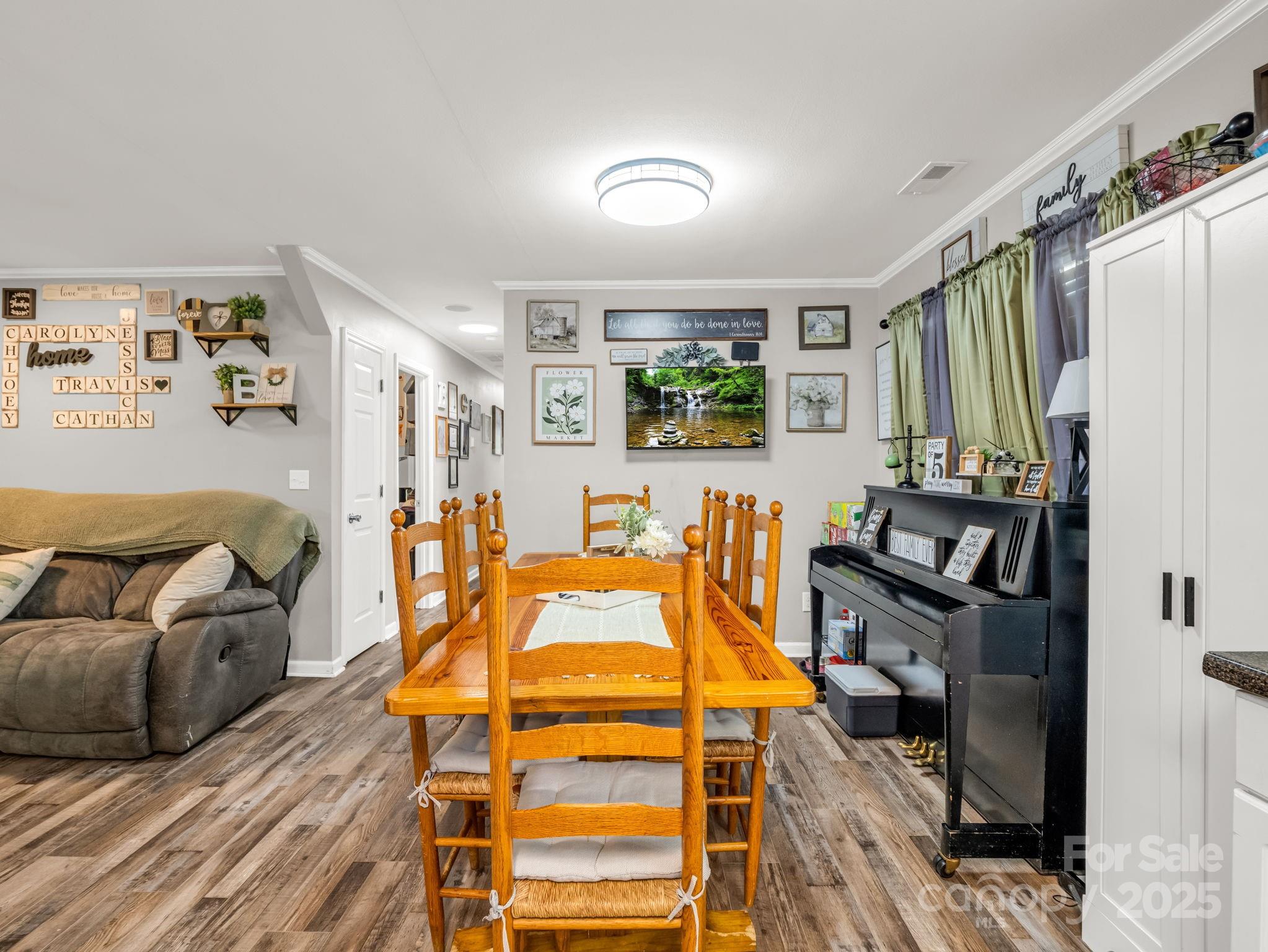 261 Faye Toney Road Mooresboro, NC 28114 - Photo 11 of 48 a bedroom with furniture and wooden floor