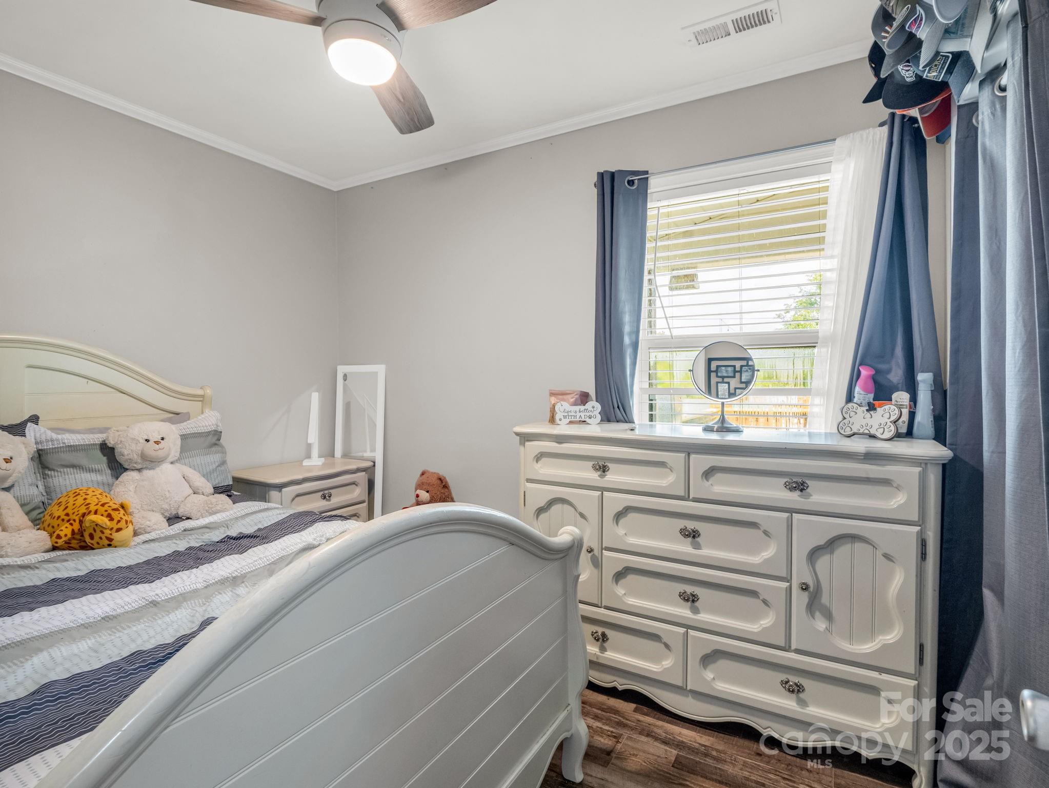 261 Faye Toney Road Mooresboro, NC 28114 - Photo 20 of 48 a bedroom with a bed and a window