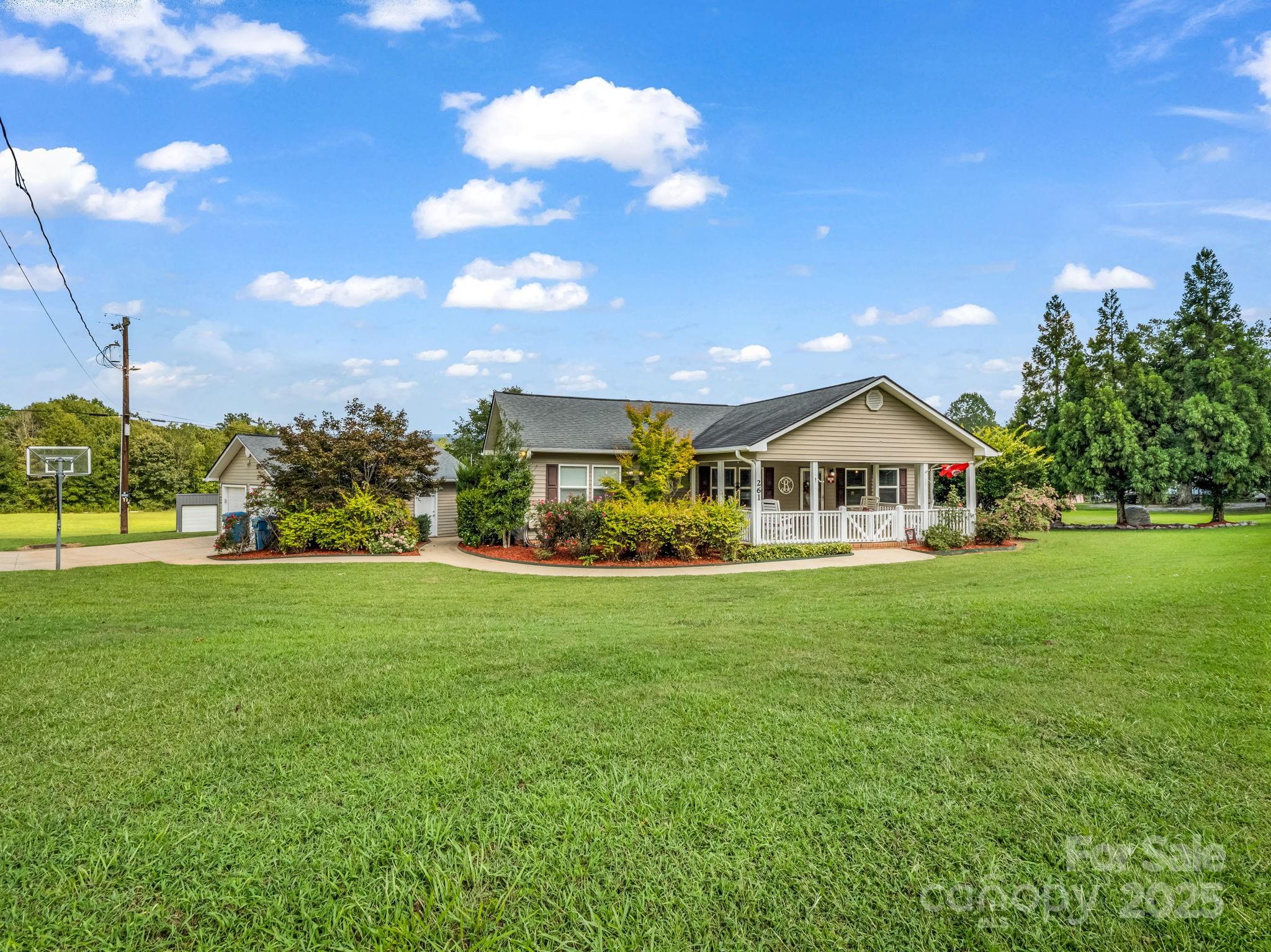 261 Faye Toney Road Mooresboro, NC 28114 - Photo 2 of 48 a front view of house with yard and green space