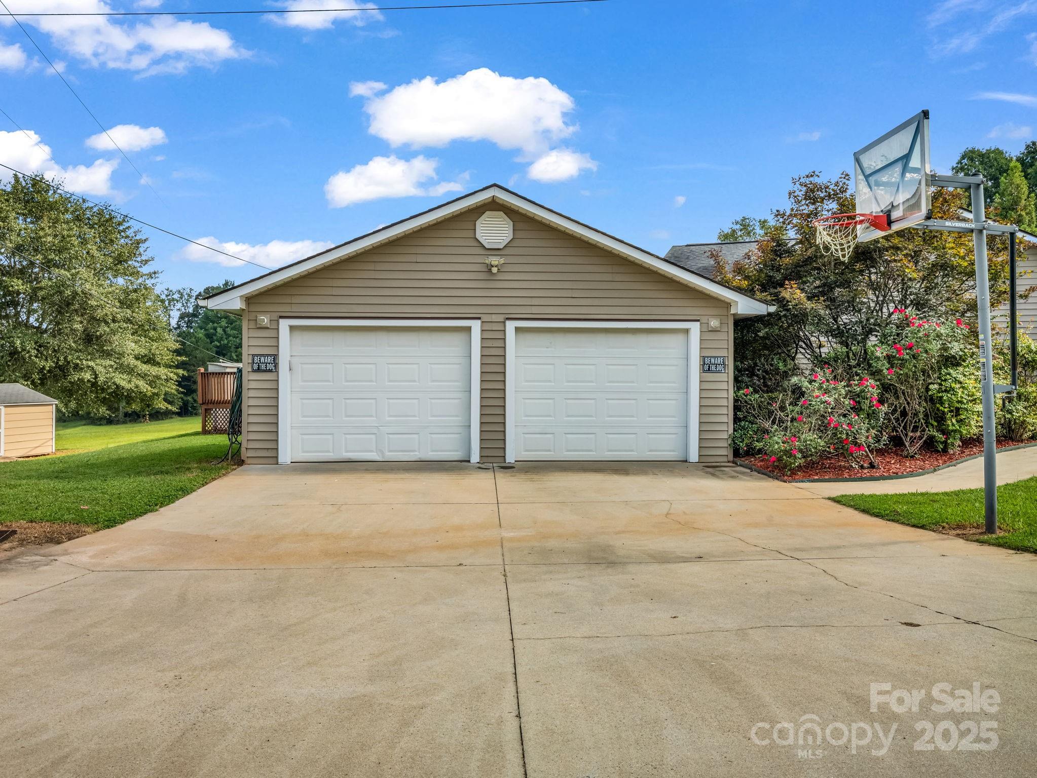 261 Faye Toney Road Mooresboro, NC 28114 - Photo 28 of 48 a view of garage and yard