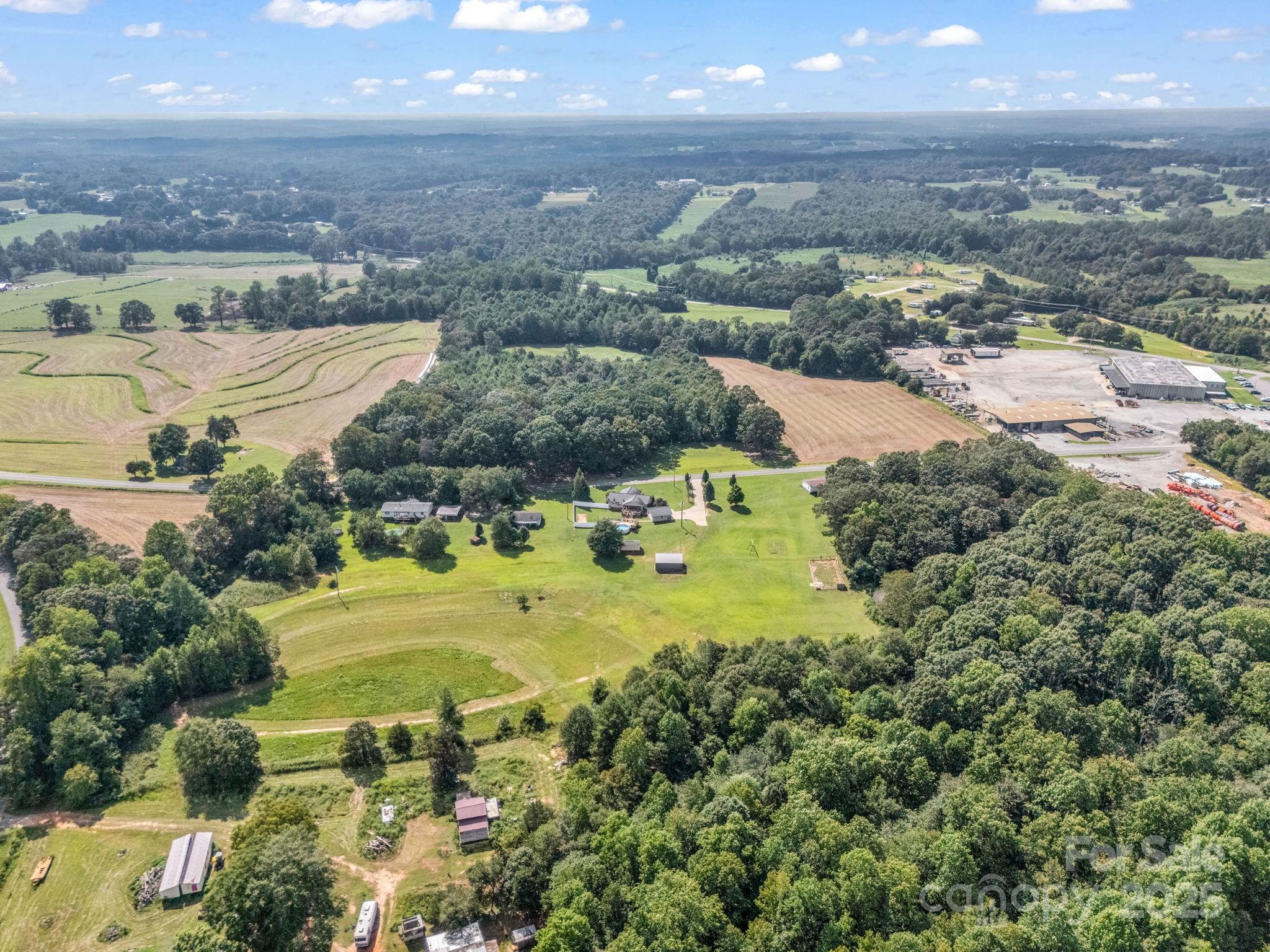 261 Faye Toney Road Mooresboro, NC 28114 - Photo 41 of 48 an aerial view of residential houses with outdoor space