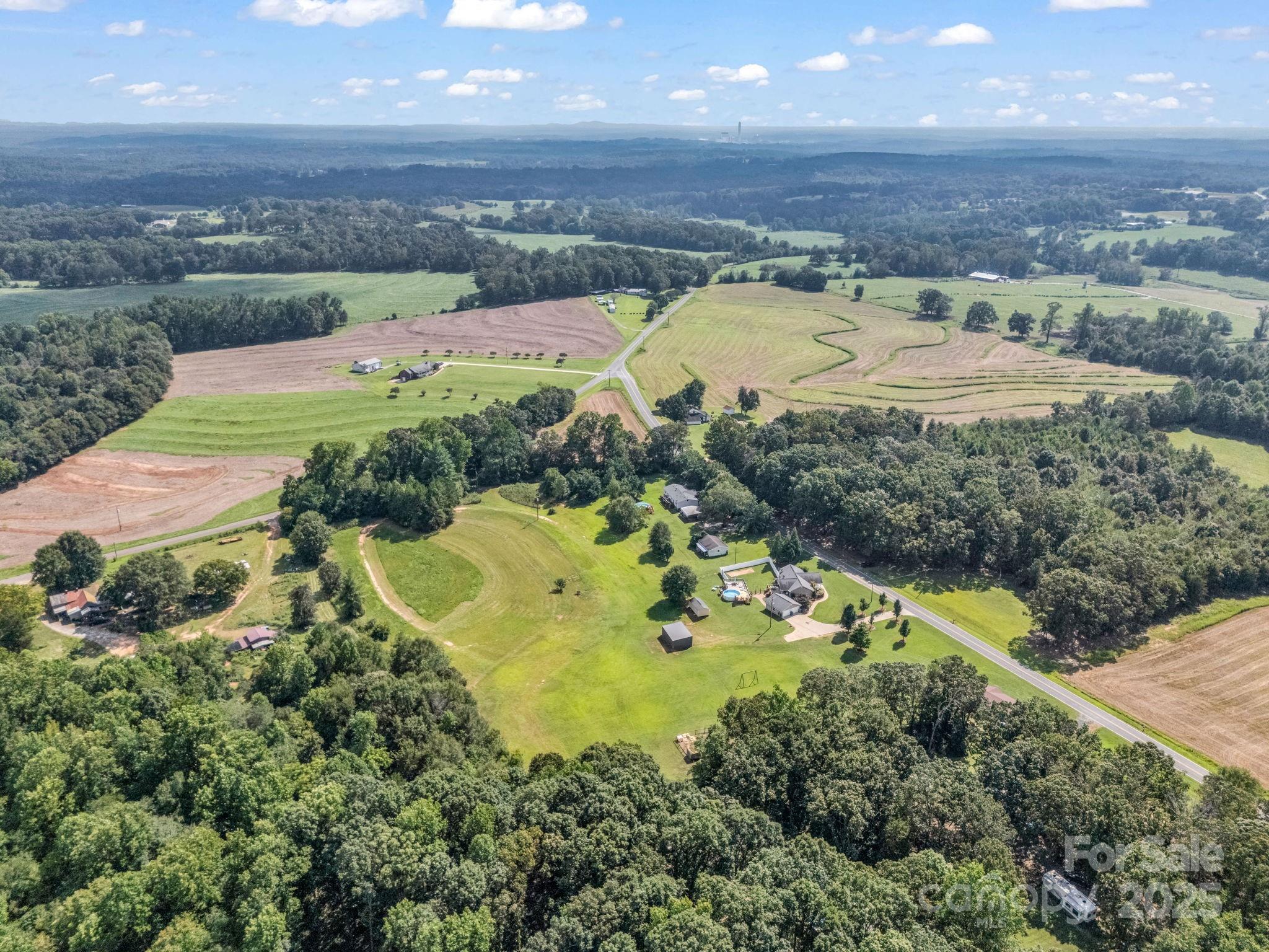 261 Faye Toney Road Mooresboro, NC 28114 - Photo 43 of 48 an aerial view of residential houses with outdoor space