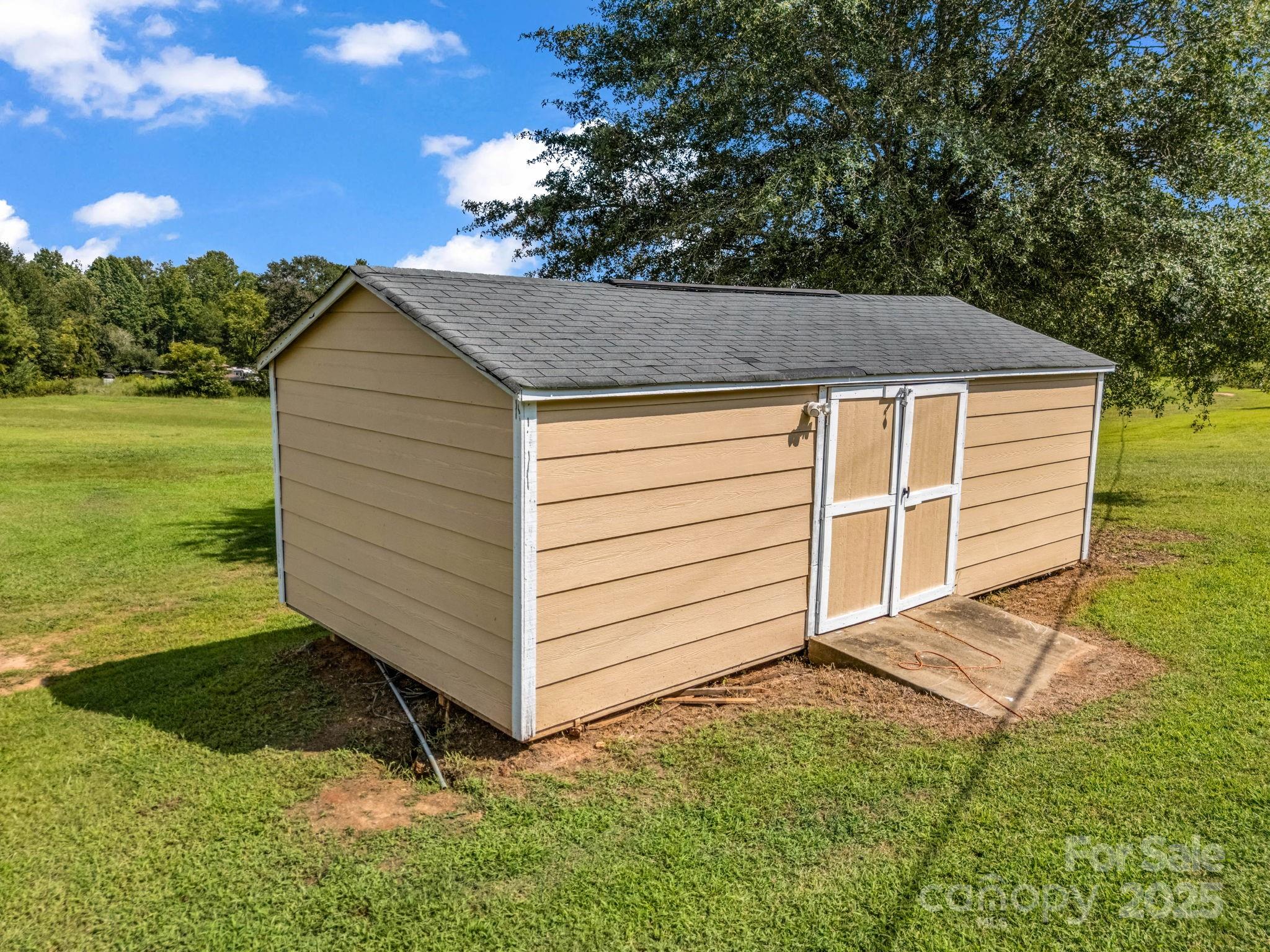 261 Faye Toney Road Mooresboro, NC 28114 - Photo 48 of 48 a view of a house with a backyard