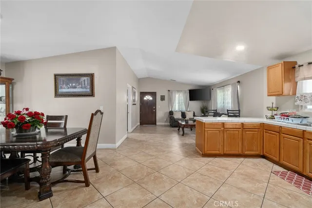 a kitchen with furniture and window