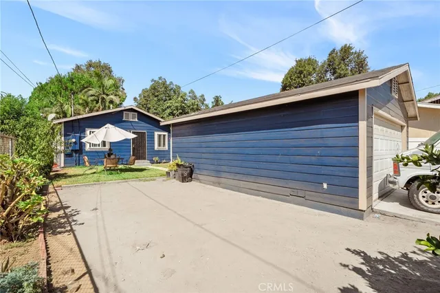 a house view with a garden space