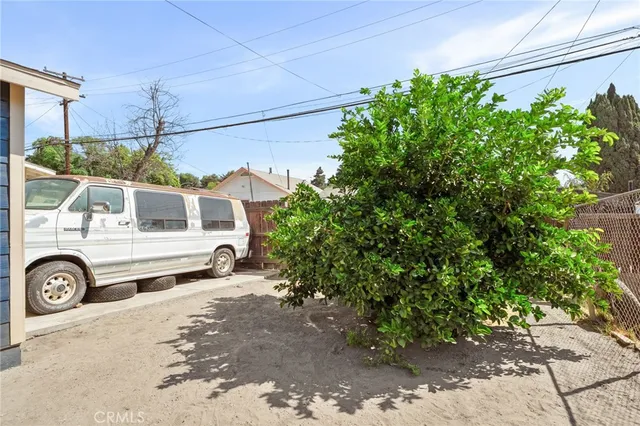 a house with trees in front of it