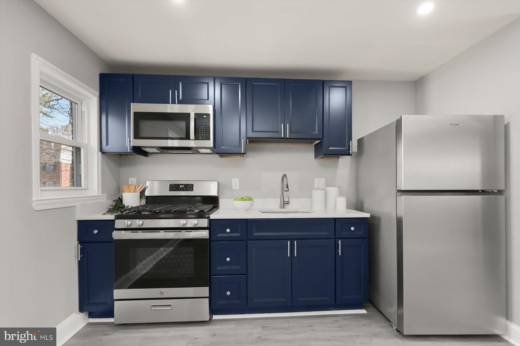 750 Charing Cross Road Baltimore, MD 21229 - Photo 9 of 29 Quartz counters and gas cooking