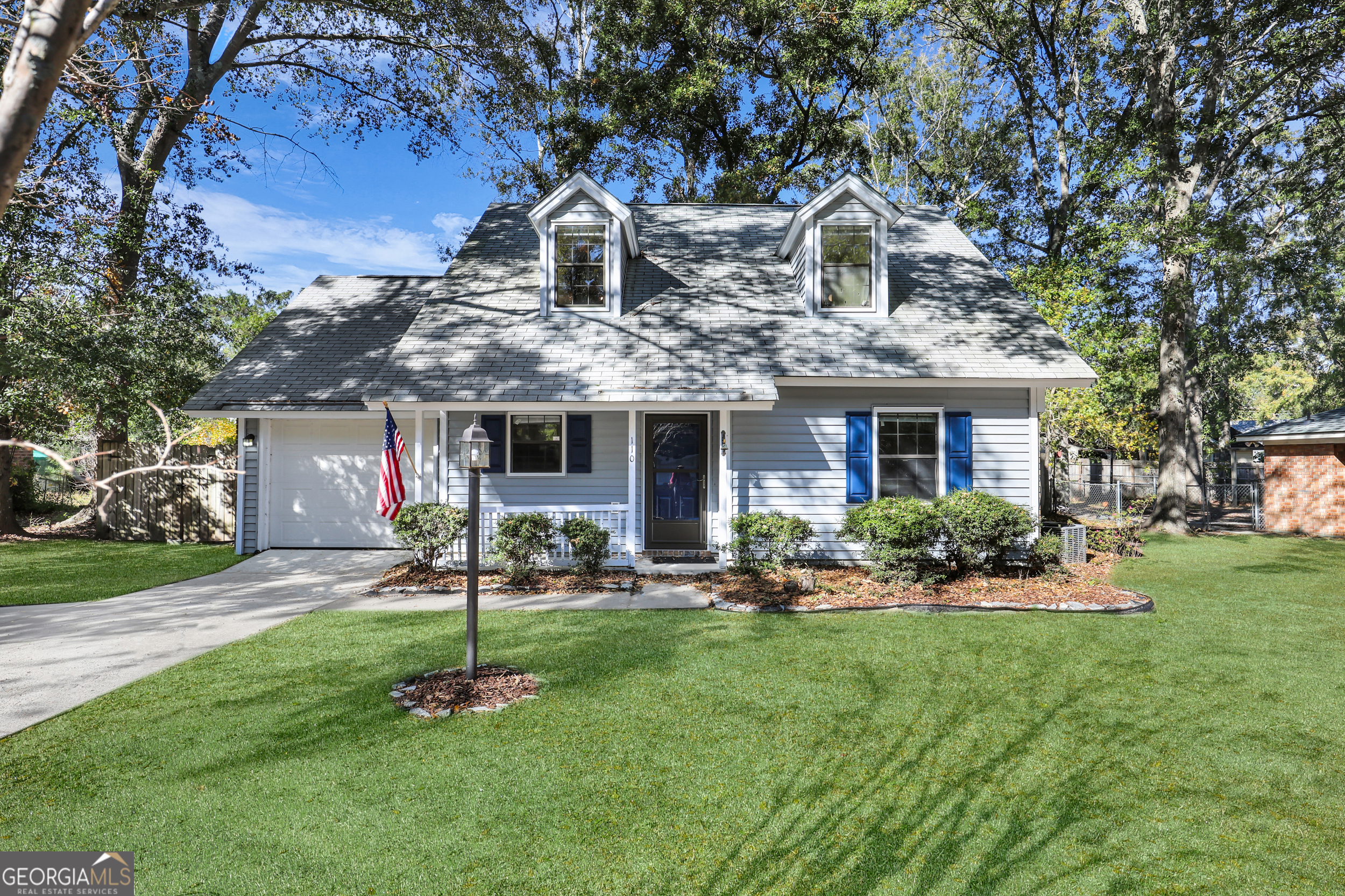 110 Magnolia Drive Springfield, GA 31329 - Photo 1 of 1 a front view of a house with a yard and porch