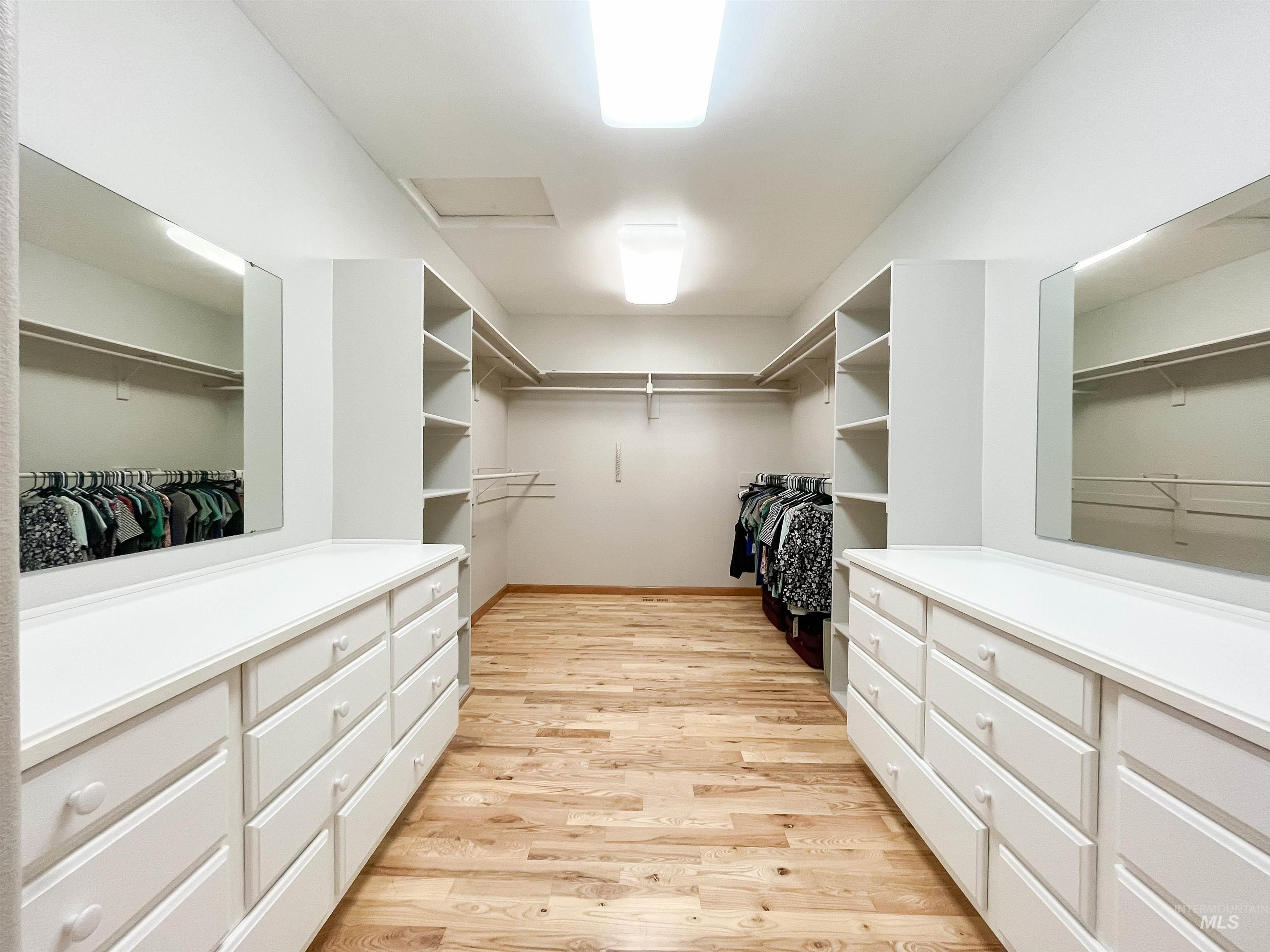 5231 North Morninggale Way Boise, ID 83713 - Photo 10 of 44 Spacious closet with light wood finished floors