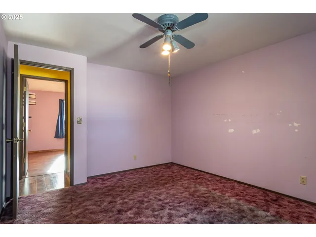 a view of a backyard with a garden