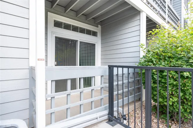 a view of a large building from a balcony