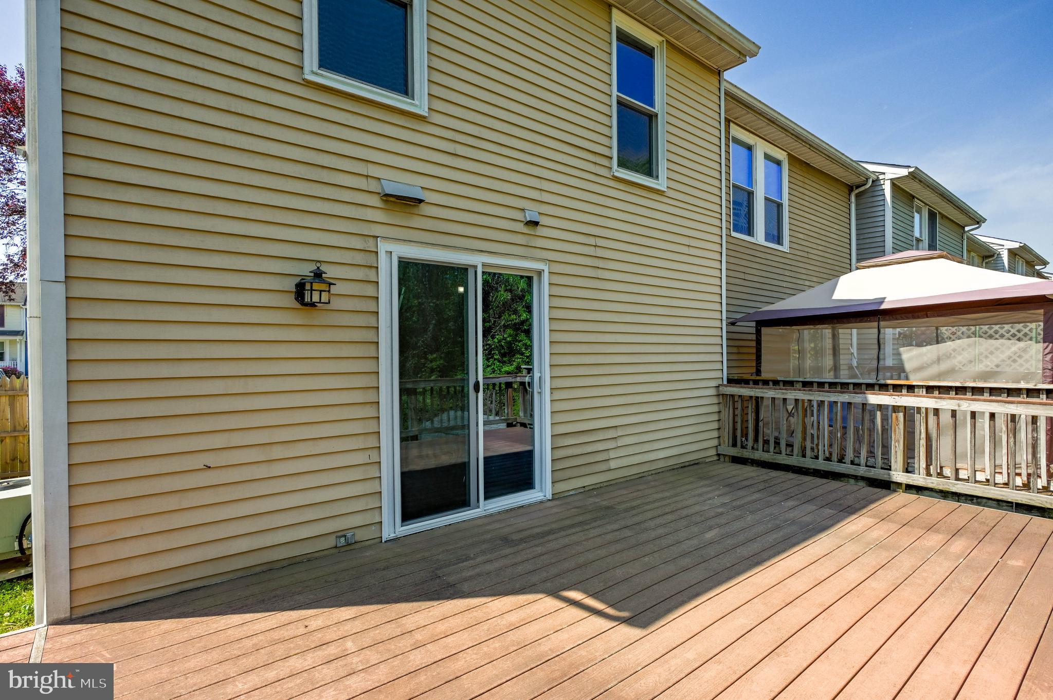 22 Morning Court Rosedale, MD 21237 - Photo 12 of 42 a view of a house with a deck