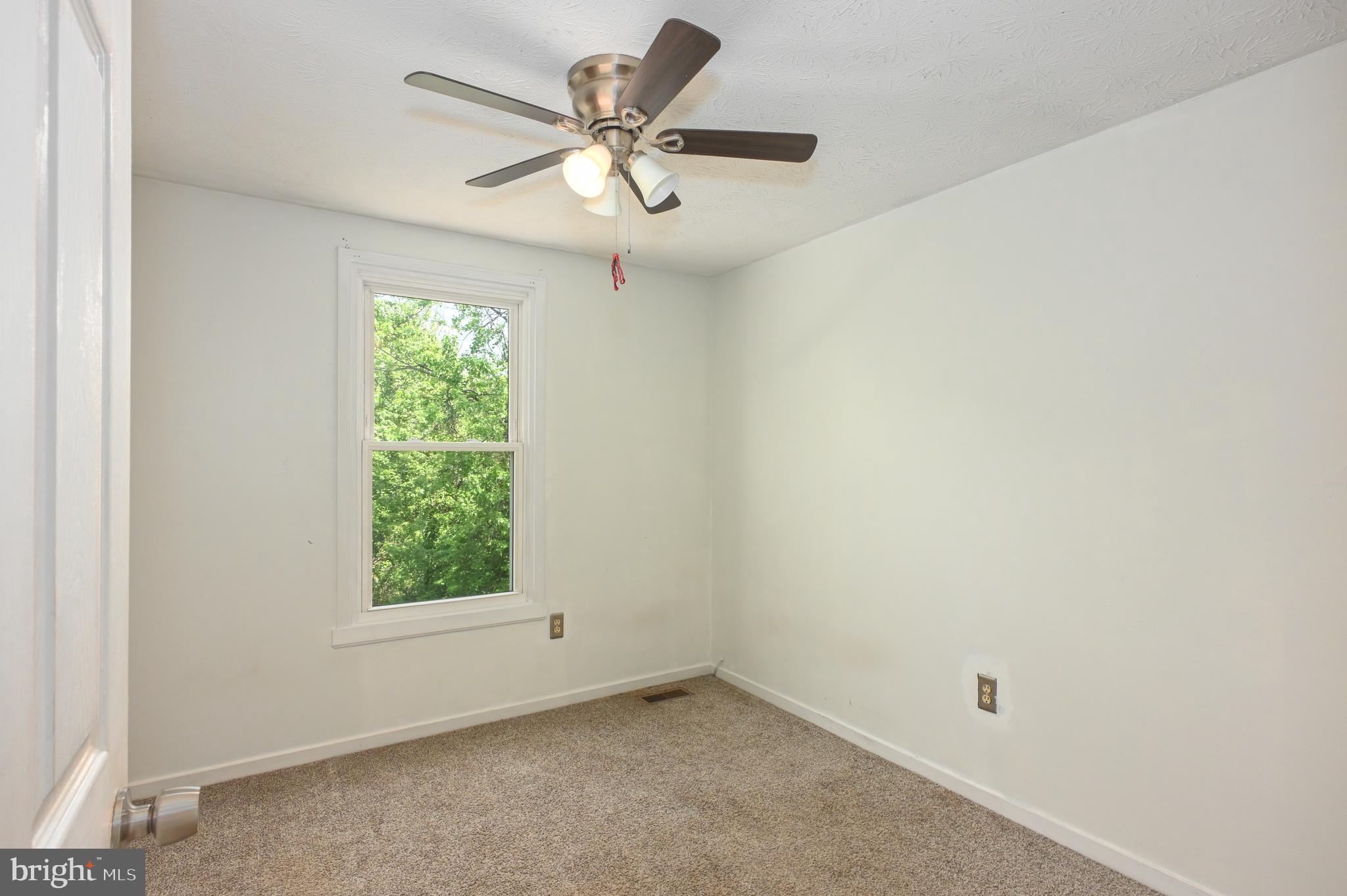 22 Morning Court Rosedale, MD 21237 - Photo 35 of 42 an empty room with a window