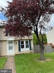 22 Morning Court Rosedale, MD 21237 - Photo 42 of 42 a front view of a house with a garden