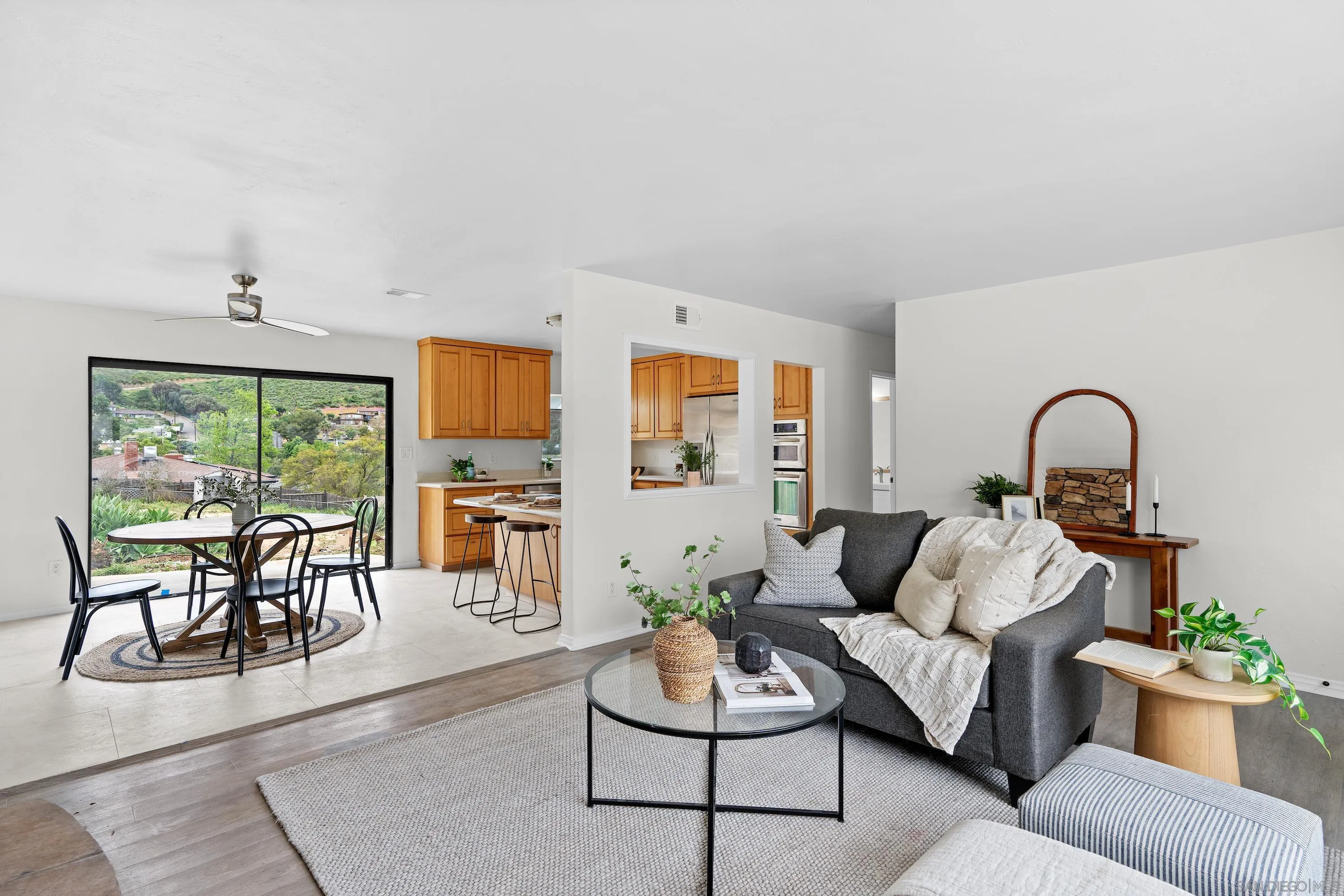 8612 Almond Road Lakeside, CA 92040 - Photo 1 of 30 a living room with furniture and wooden floor