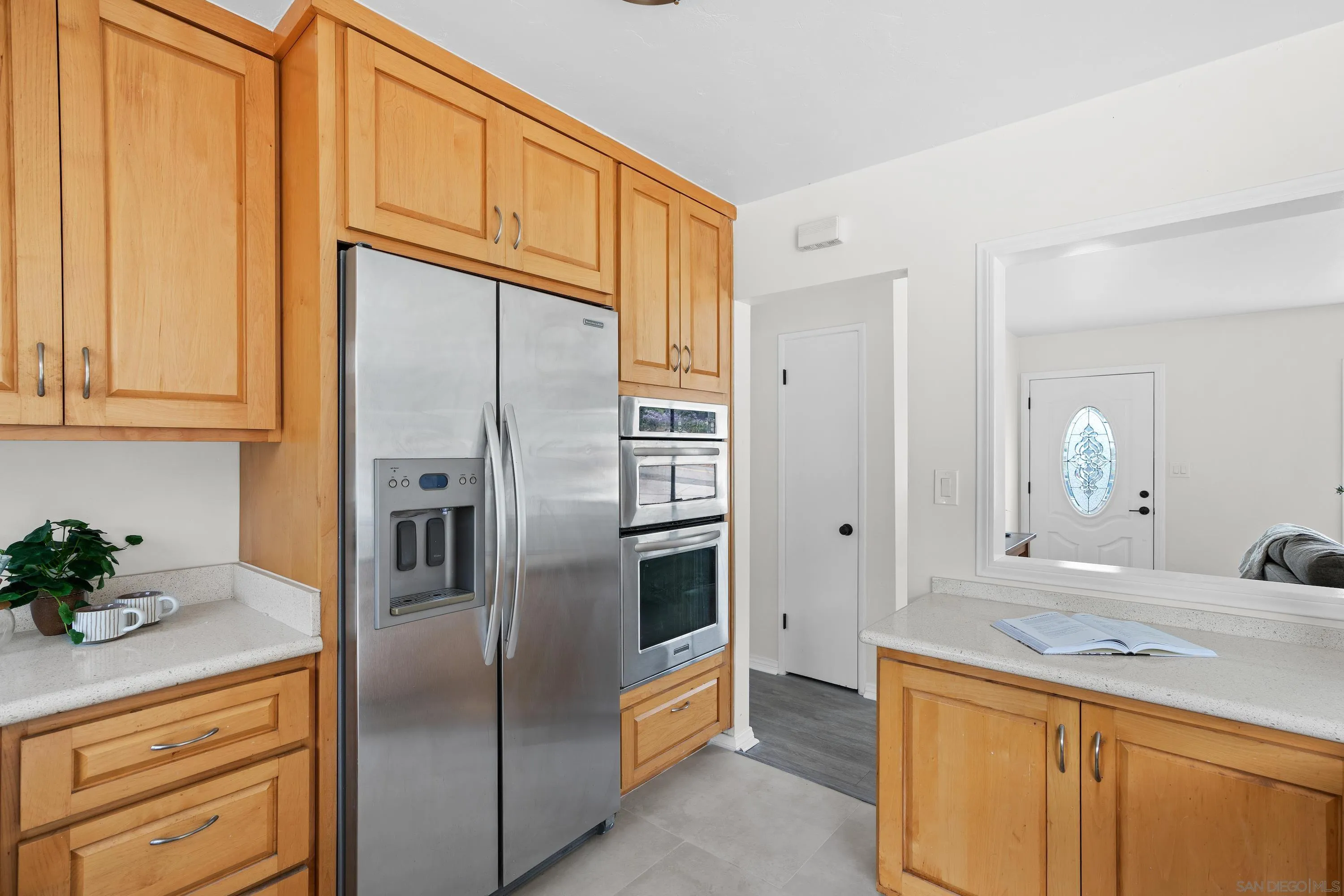 8612 Almond Road Lakeside, CA 92040 - Photo 23 of 30 a kitchen with stainless steel appliances granite countertop a refrigerator and a sink