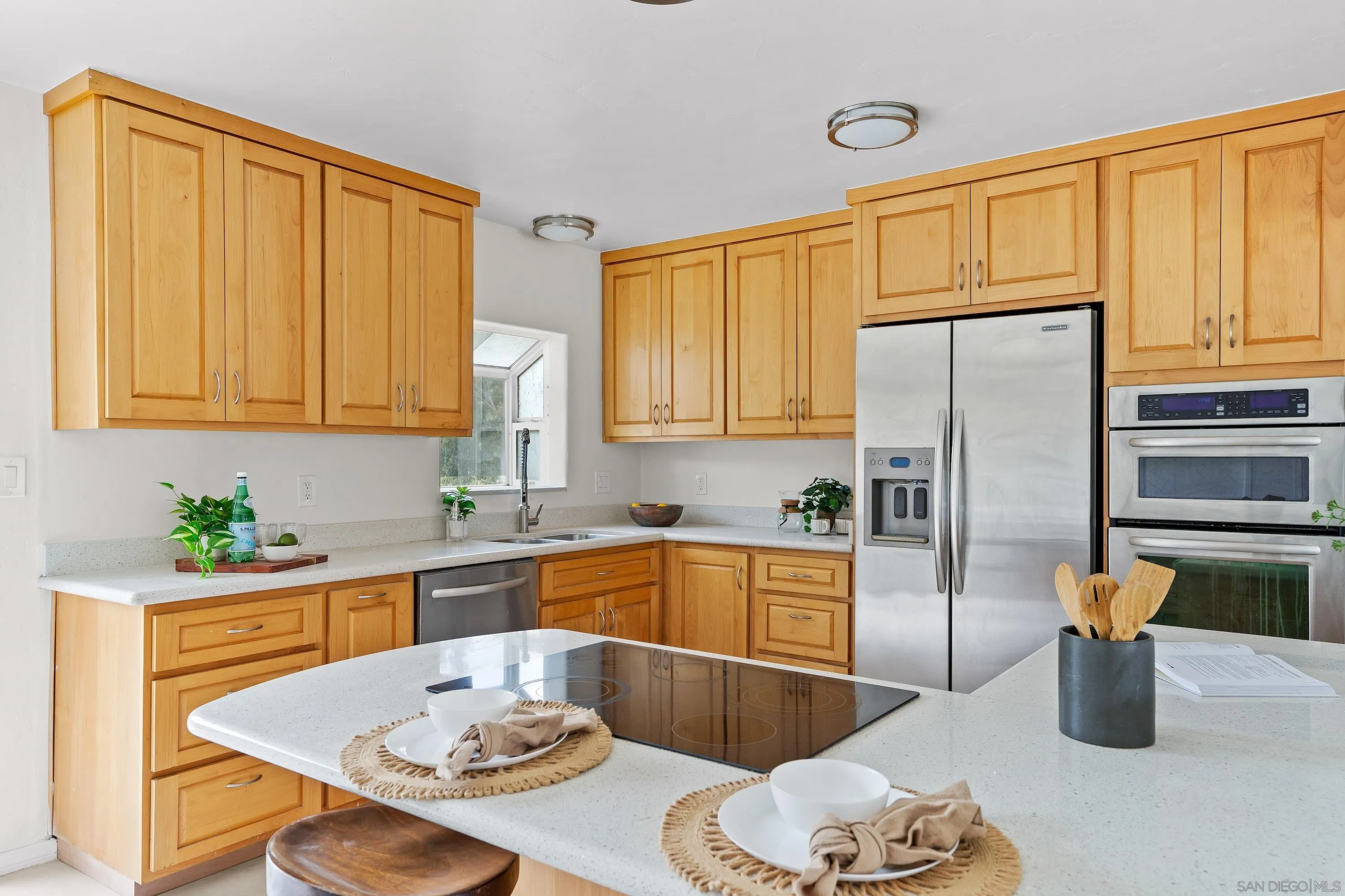 8612 Almond Road Lakeside, CA 92040 - Photo 8 of 30 a kitchen with a refrigerator and a sink