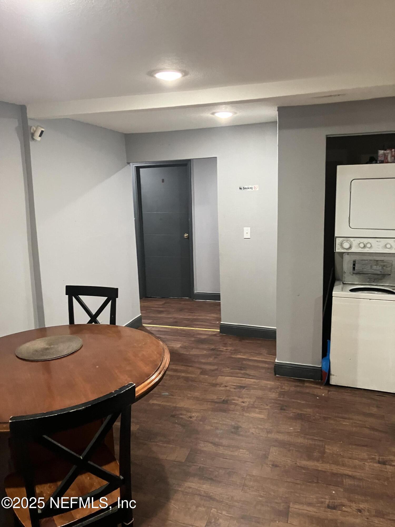 1663 West 35th Street Jacksonville, FL 32209 - Photo 2 of 16 a view of a dining room with furniture and wooden floor