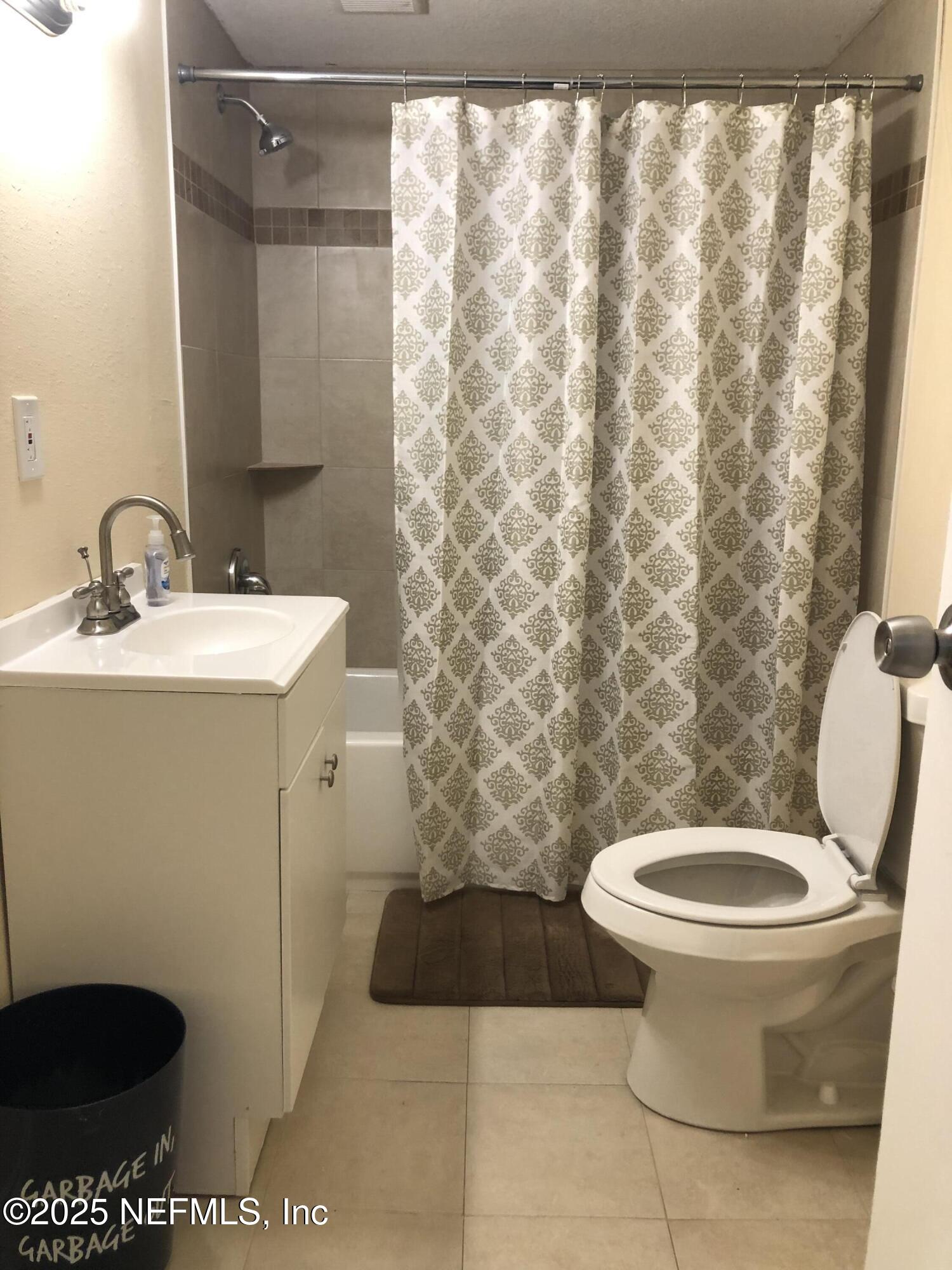 1663 West 35th Street Jacksonville, FL 32209 - Photo 6 of 16 a bathroom with a toilet and a sink
