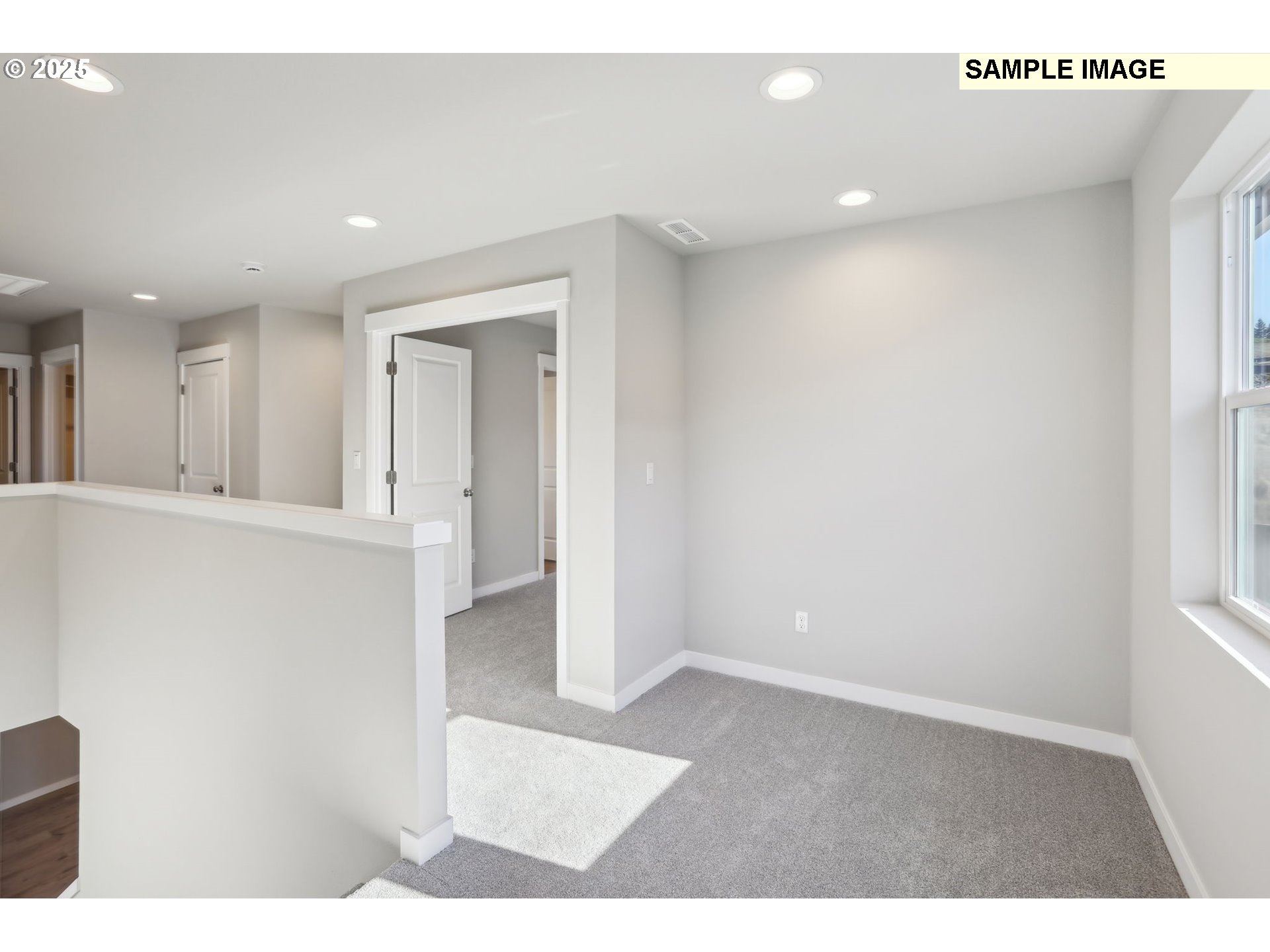 3675 Northeast Claire Road, Unit 98 Estacada, OR 97023 - Photo 13 of 23 a view of an empty room with wooden floor