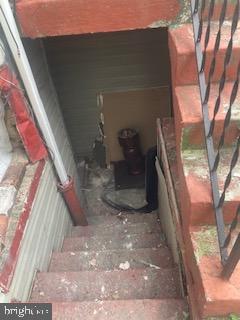 722 Shepherd Street Northwest Washington, DC 20011 - Photo 7 of 25 Stairway leading to a hidden basement space.