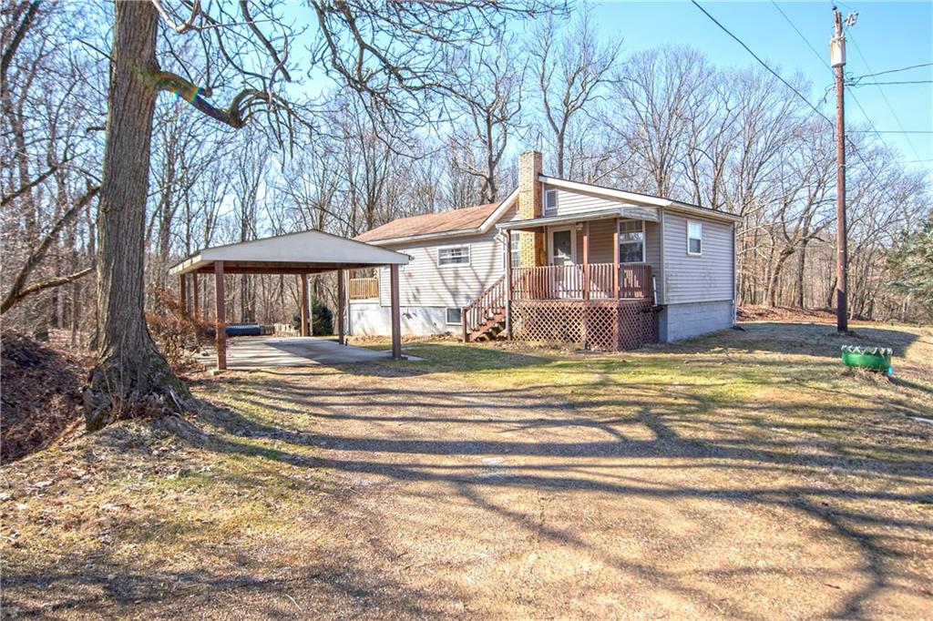 855 Highway 56 Apollo, PA 15613 - Photo 1 of 25 a front view of a house with a yard