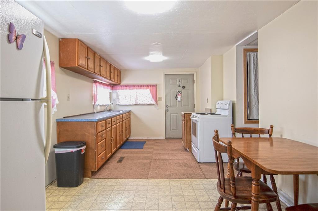 855 Highway 56 Apollo, PA 15613 - Photo 12 of 25 a kitchen with sink cabinets and refrigerator